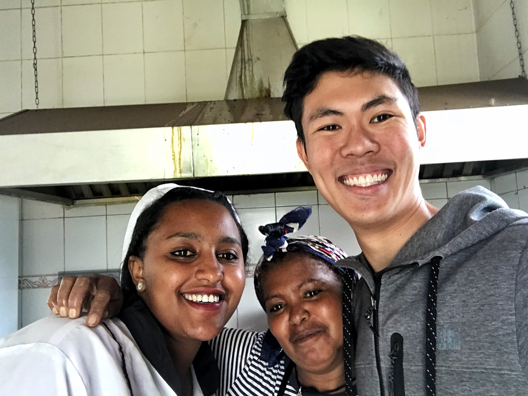 A business major in Banking and Finance (ITP) intern, with a two workers from Wilmar International employees in Ethiopia