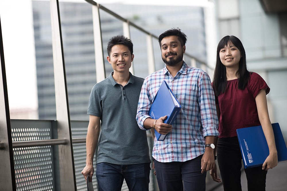 Students walking along corridor