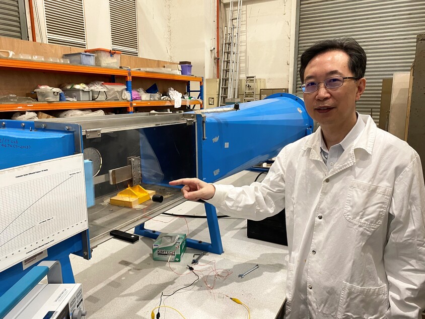 Prof Yang Yaowen with the device that harnesses energy from wind