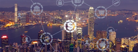 Graphic icons, with the dollar sign highlighted, over a city at night