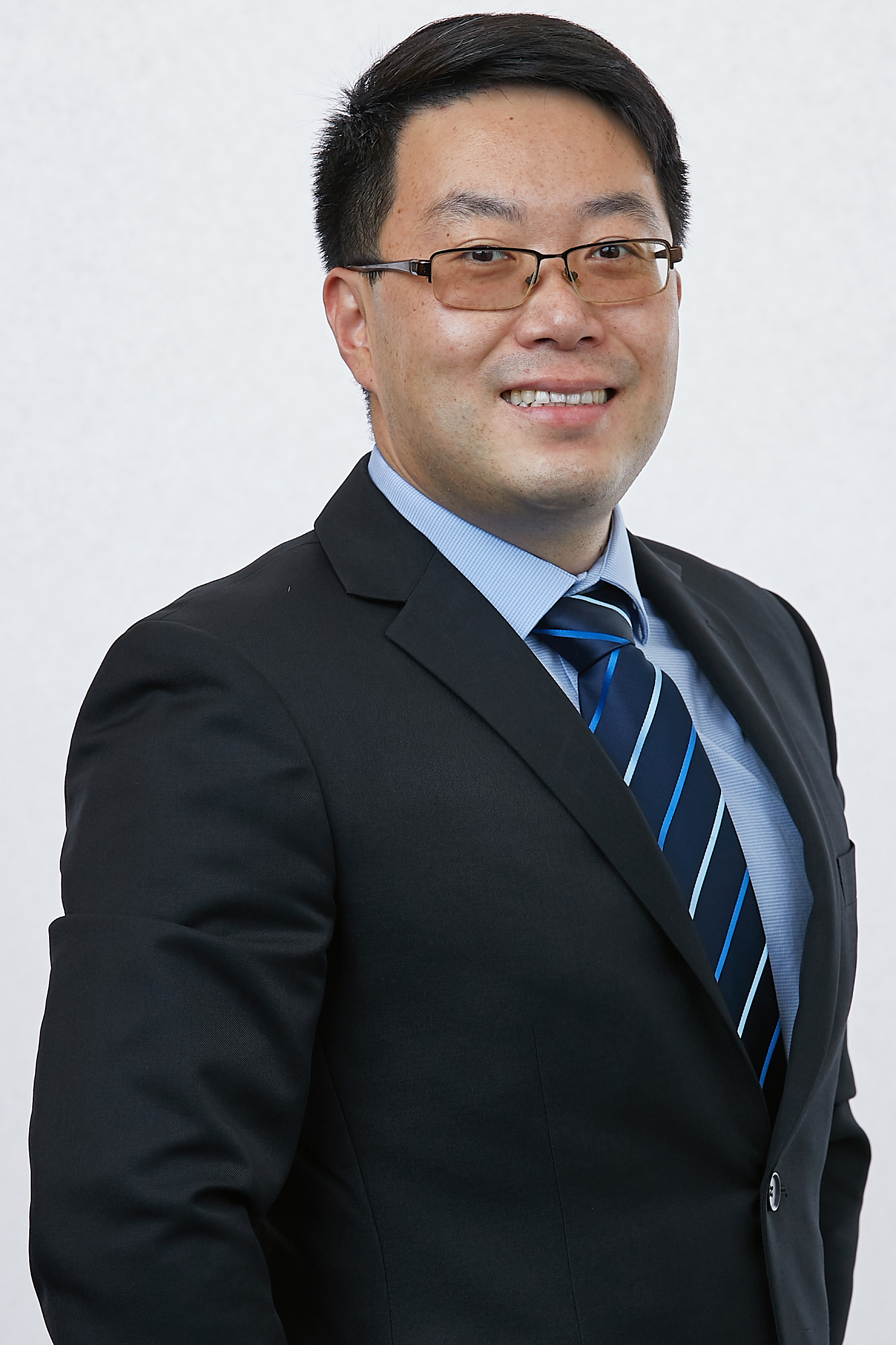 Portrait photo of Asst Prof Jack Tong