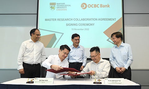 Photo of a research collaboration agreement signing ceremony.