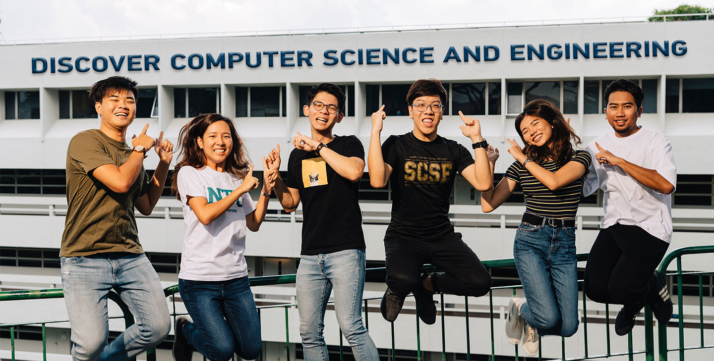 Web banner of students jumping in front of School of Computer Science and Engineering building.
