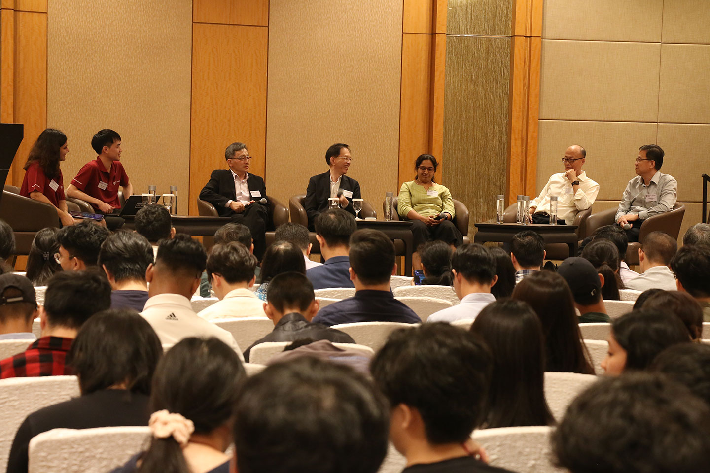 Photo of CCDS faculty members addressed questions from audience both in person and through the interactive 'Wooclap' platform.