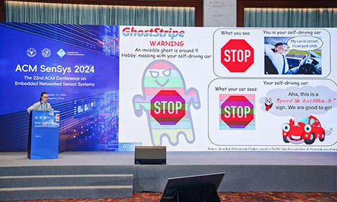 Thumbnail photo of a researcher presenting the one-minute madness talk.