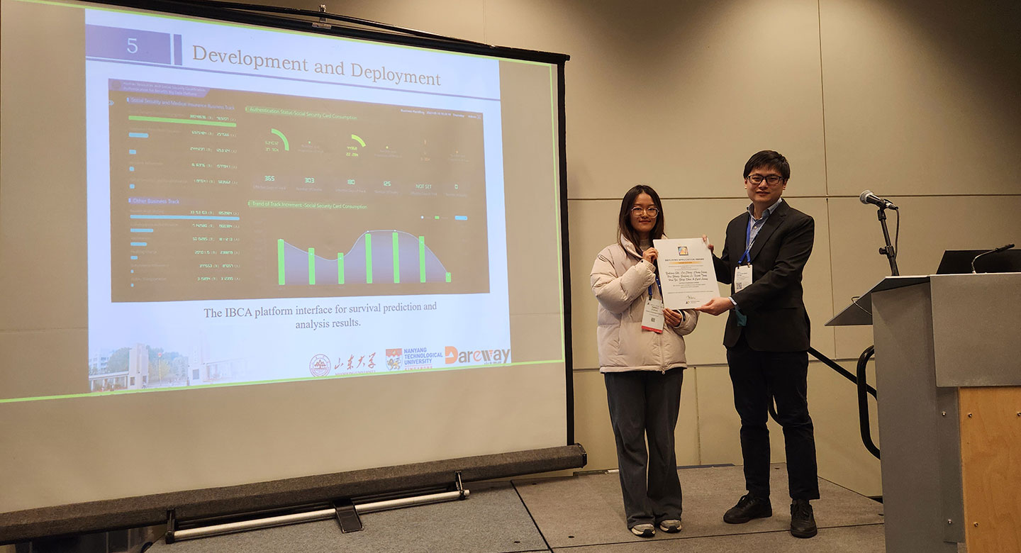 Photo of a postgraduate received Paper Award on stage at AAAI 2024.