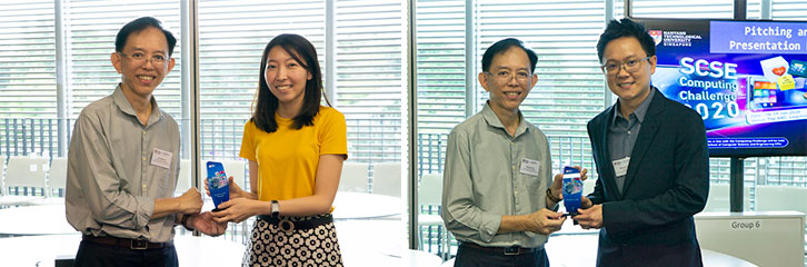 A/P Nicholas Vun, Associate Chair (Academic) presented a plaque to show appreciation for the guest judges.