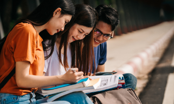 Three EEE students studying together