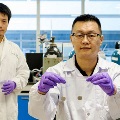 Two scientists showcasing new technology on improving safety of lithium-ion batteries during charging