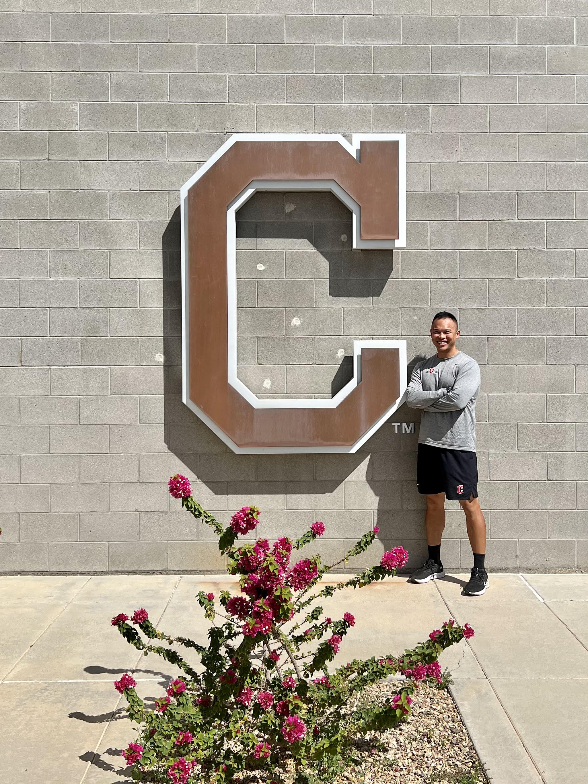 Alumnus Lionel Chia in front of Cleveland Guardians’ Player Development Complex where he works.