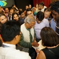 Nobel Laureate Professor Muhammad Yunus signing autographs and signatures for participants