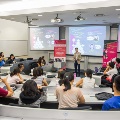 Male speaker shares his stories and journey to a group of students in the lecture room
