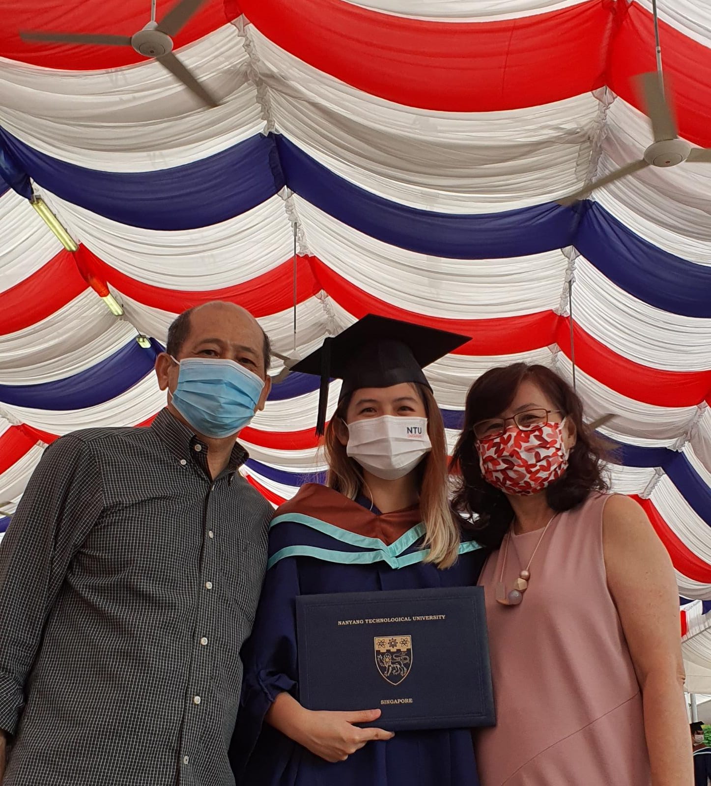 Mr Benjamin Chan and Mrs Kathleen Chan with their daughter Dominique, who recently graduated.