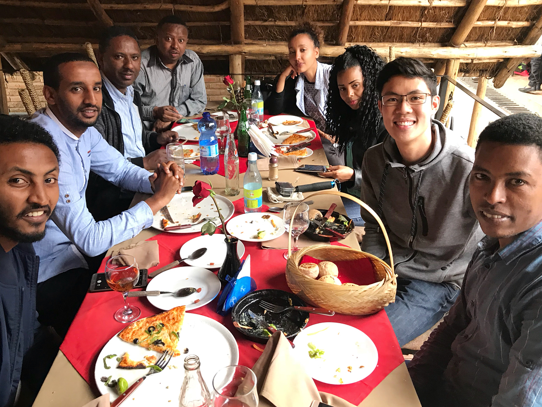 A business major in Banking and Finance (ITP) intern, sharing a meal with  Wilmar International employees in Ethiopia