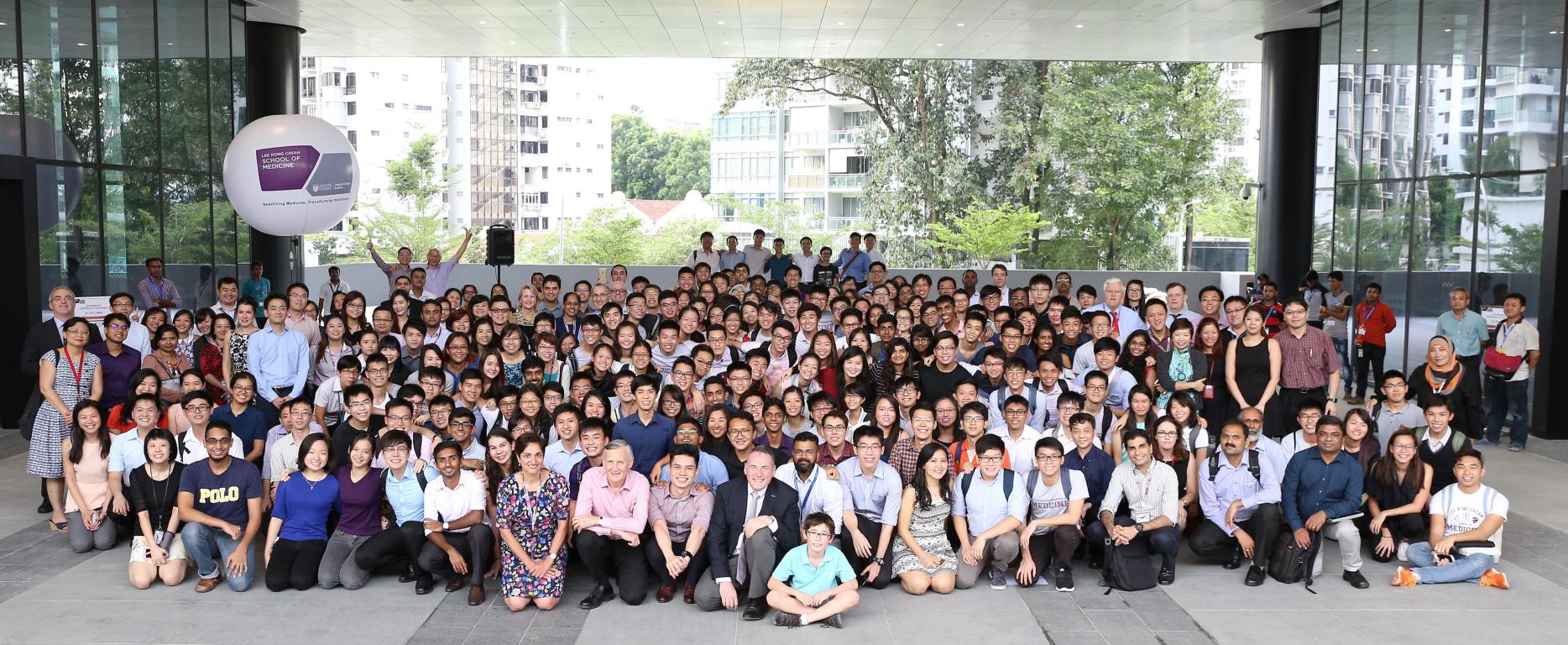 LKCMedicine staff, students and faculty gather for a group photo at CSB plaza