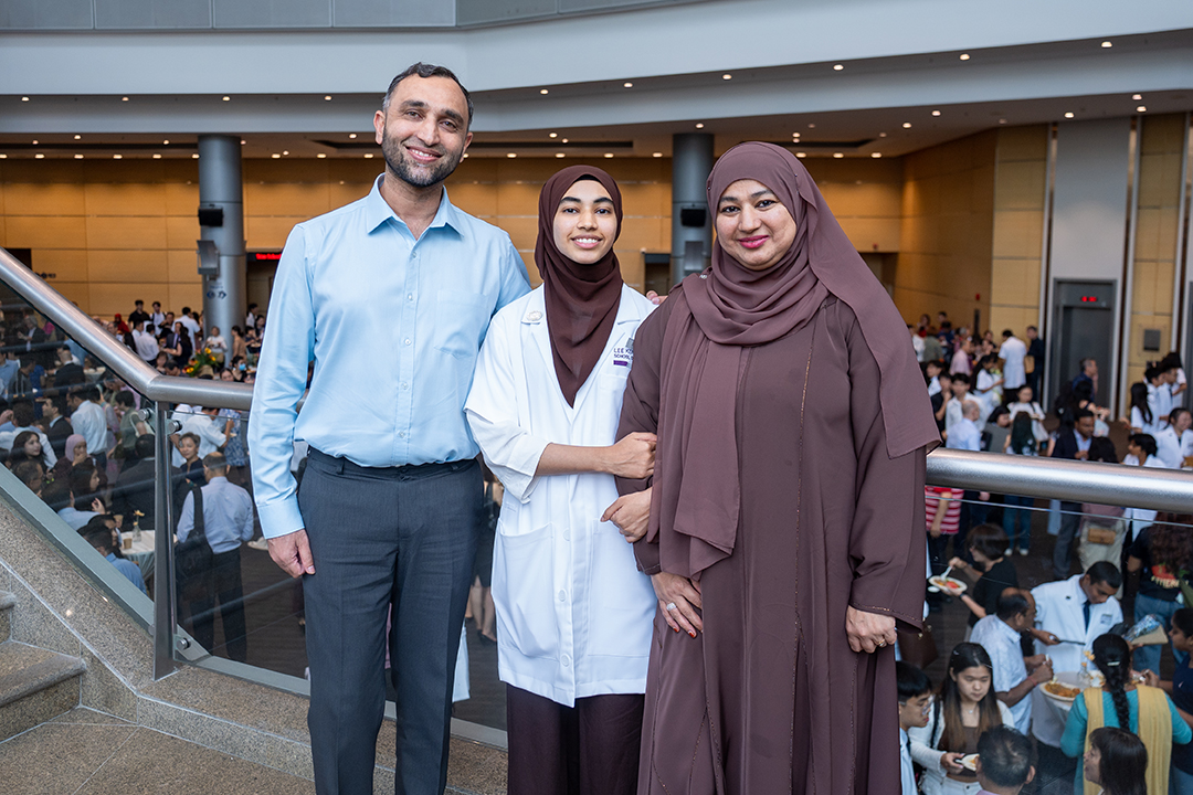 Zainab, white coat 2025