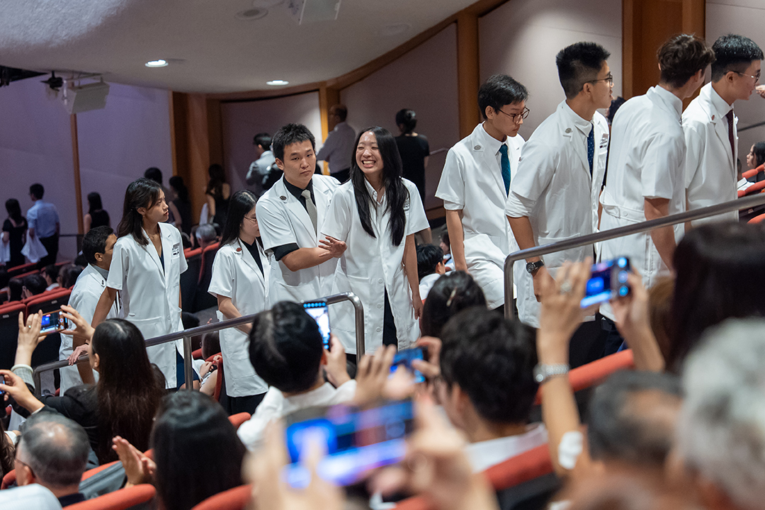 Happy Students white coat 2025