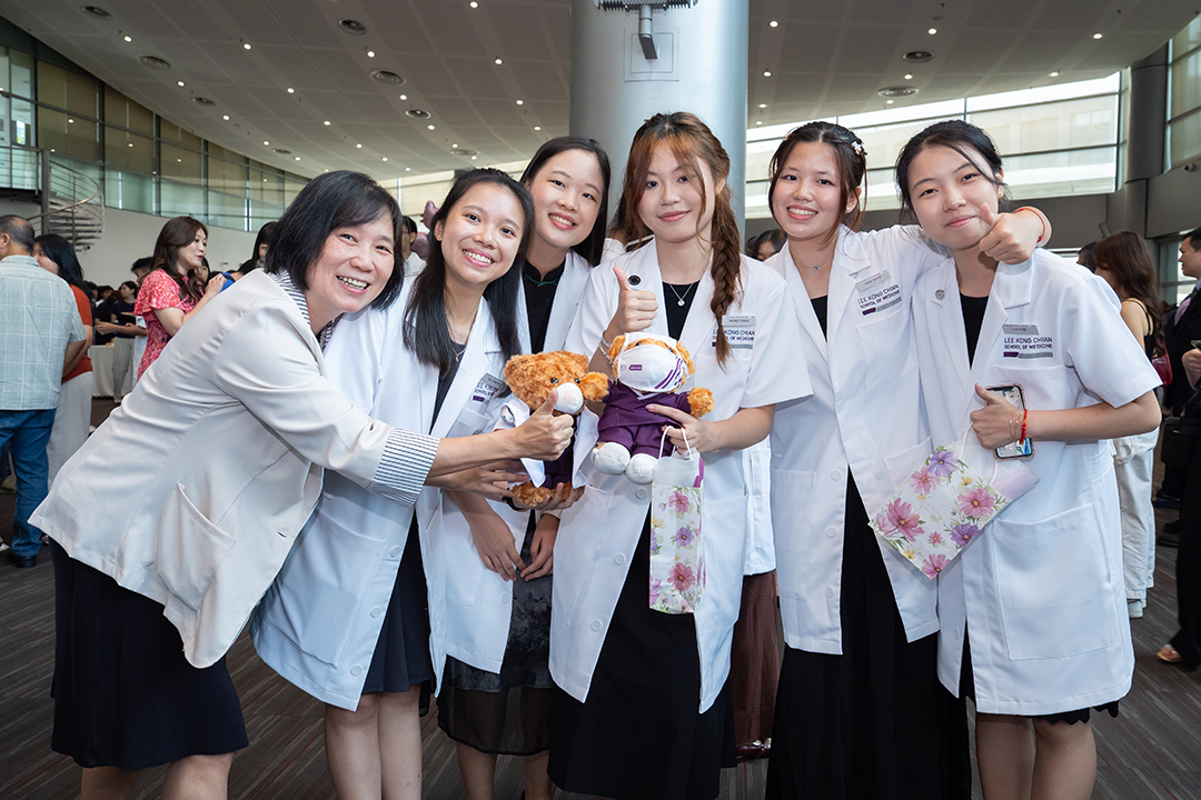 Dr Serene Ong with students, white coat ceremony