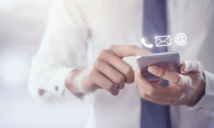 Someone typing a message on a smartphone 