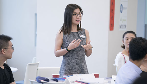 A Nanyang PMBA participant presenting to her peers at Nanyang Business School, Singapore