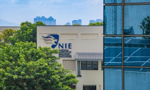 E - Main NIE Logo Building Blue Windows