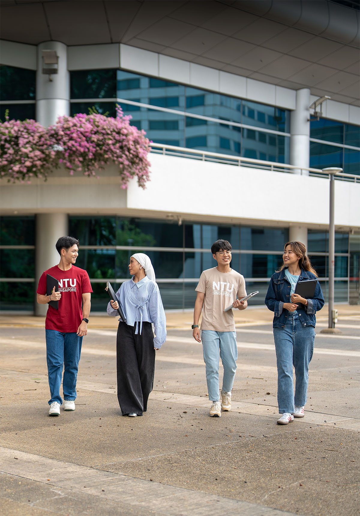 Group of students walking through campus