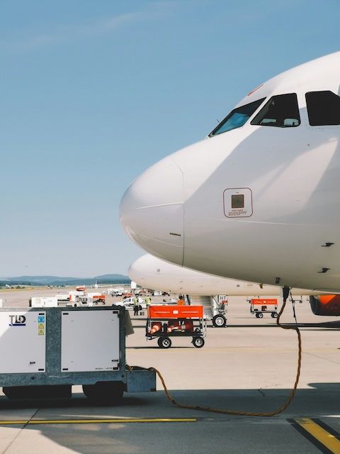 Plane being refueled at airport