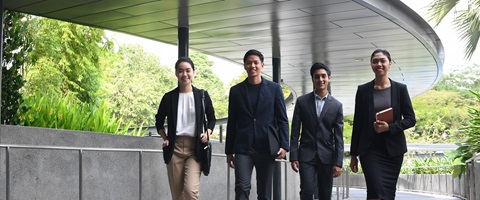 students walking in professional wear