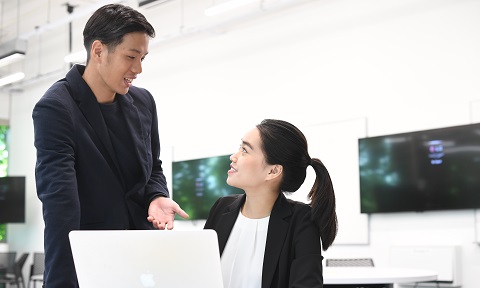 Two NTU students working in a team