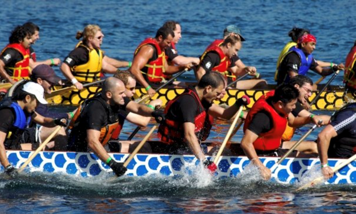 Prof Warren Chan in a dragon boat