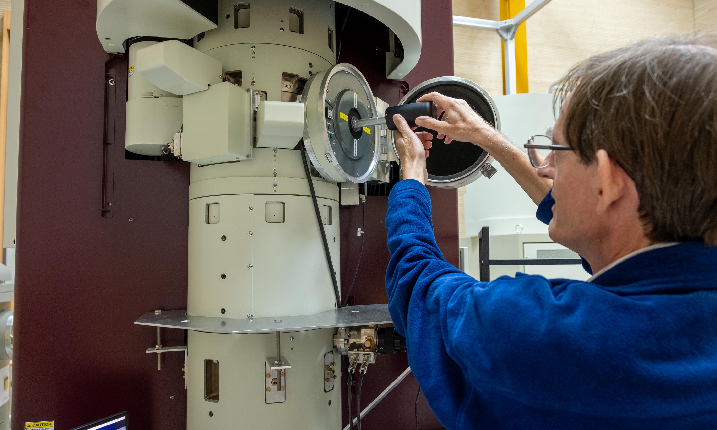 Senior Principal Research Fellow Dr Chris Boothroyd – from NTU Singapore’s Facility for Analysis, Characterisation, Testing and Simulation – with an aberration-corrected transmission electron microscope.