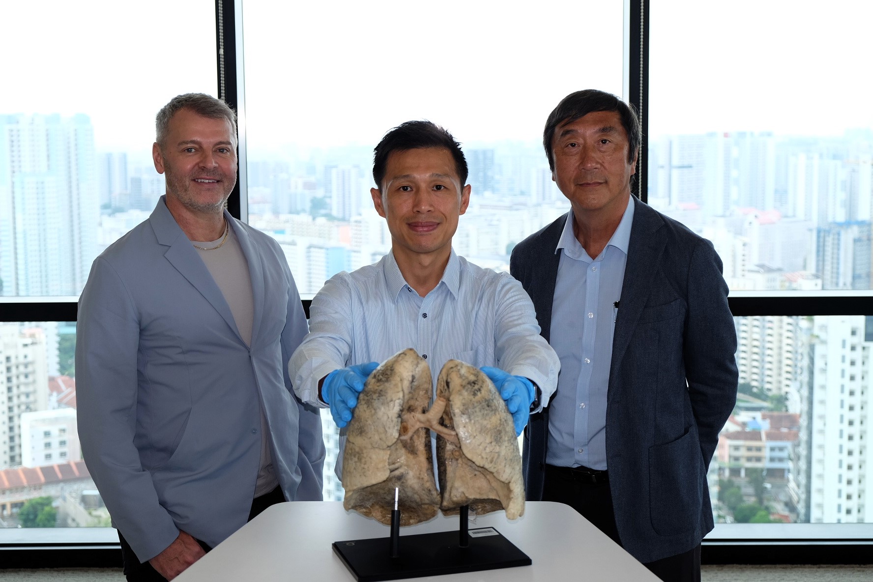Photo of NTU ASE, LKCMedicine Assoc Prof Steve Yim, who is also Principal Investigator at NTU’s EOS, NTU’s Senior Vice President (Health and Life Sciences) and Dean of LKCMedicine Professor Joseph Sung, and EOS Director Professor Benjamin Horton