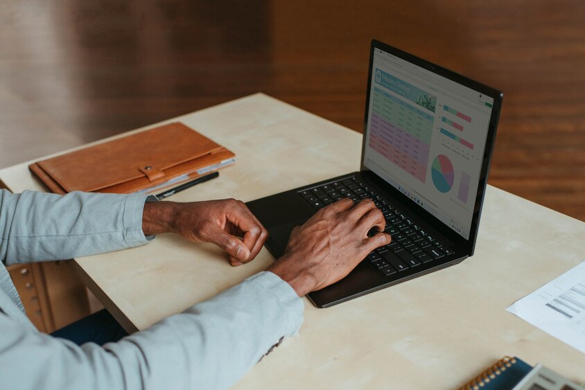 Man typing on laptop