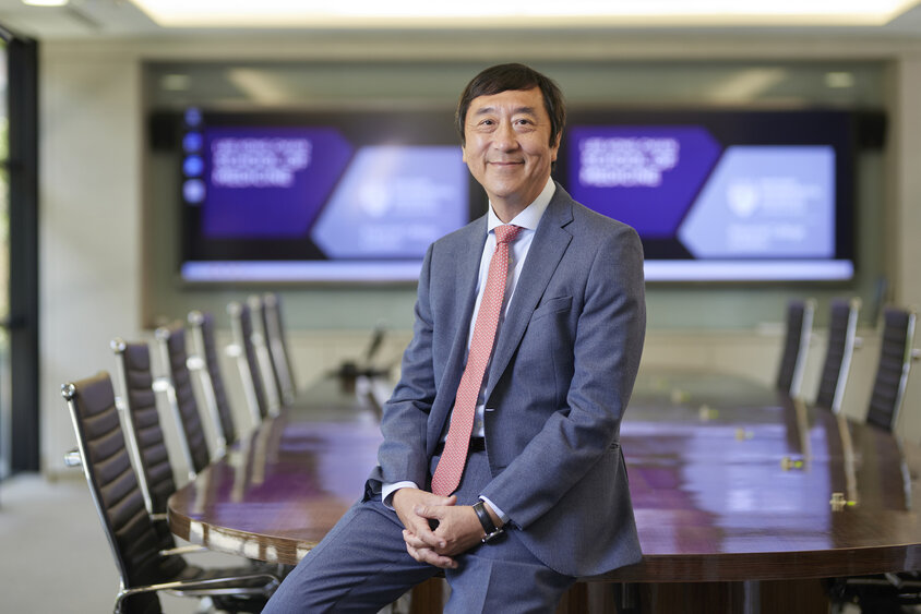 Prof Joseph Sung seated