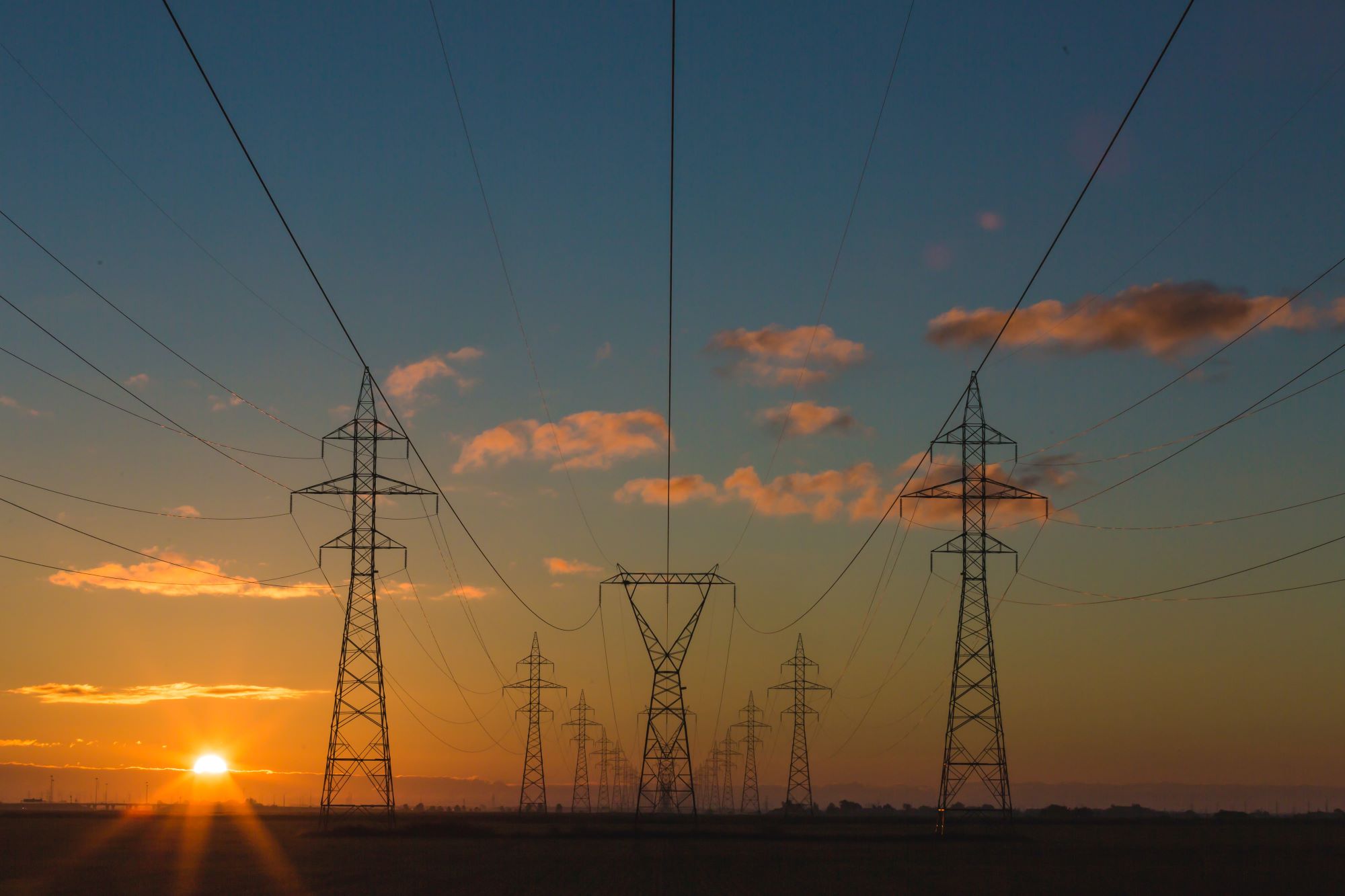 Power towers at sunset