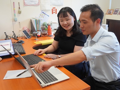 Asst Prof Yan Ran (L) and Research Fellow Dr Gong Huatian discussing the LACE model they developed. Credit: NTU Singapore