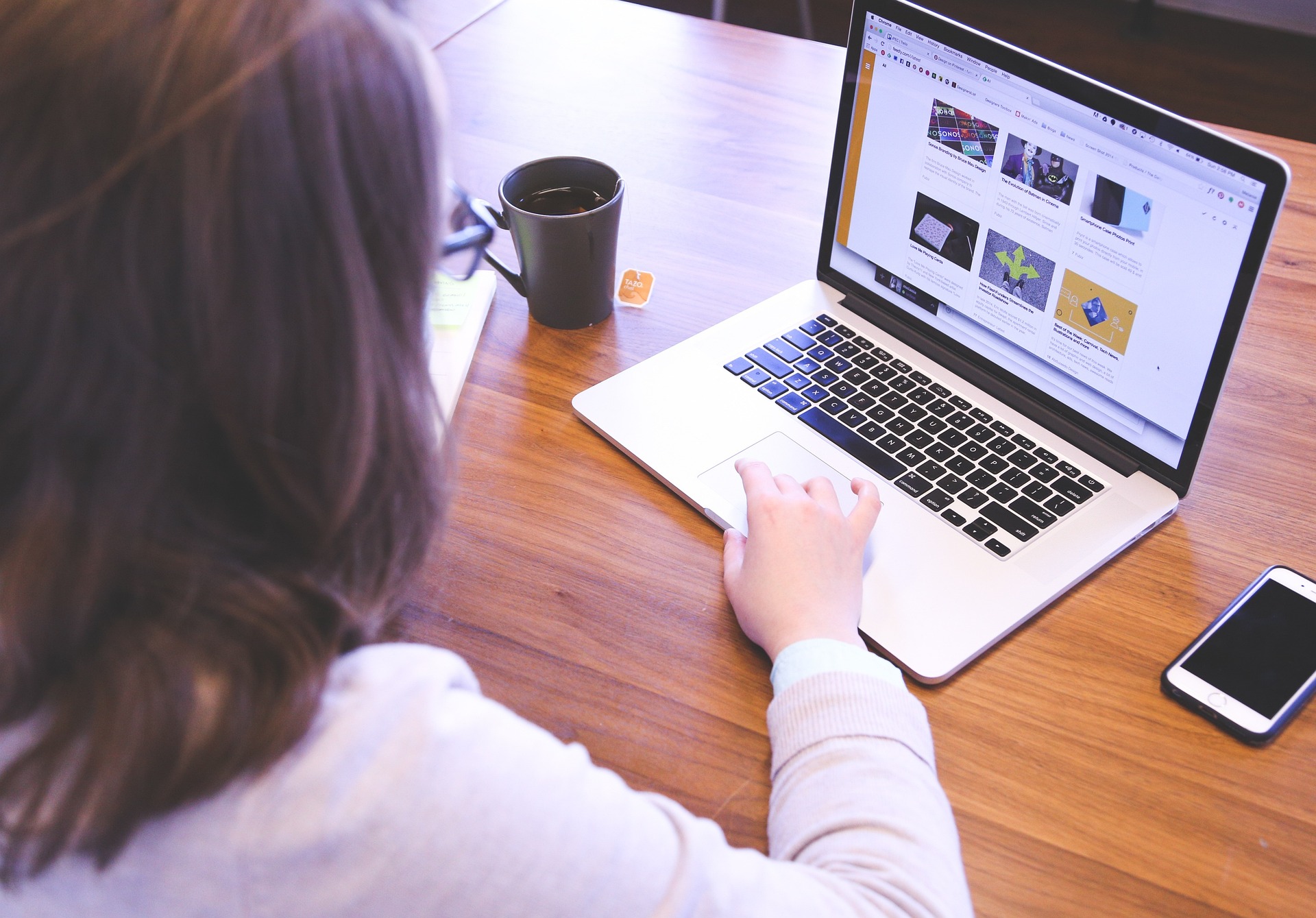 Woman looking at a laptop