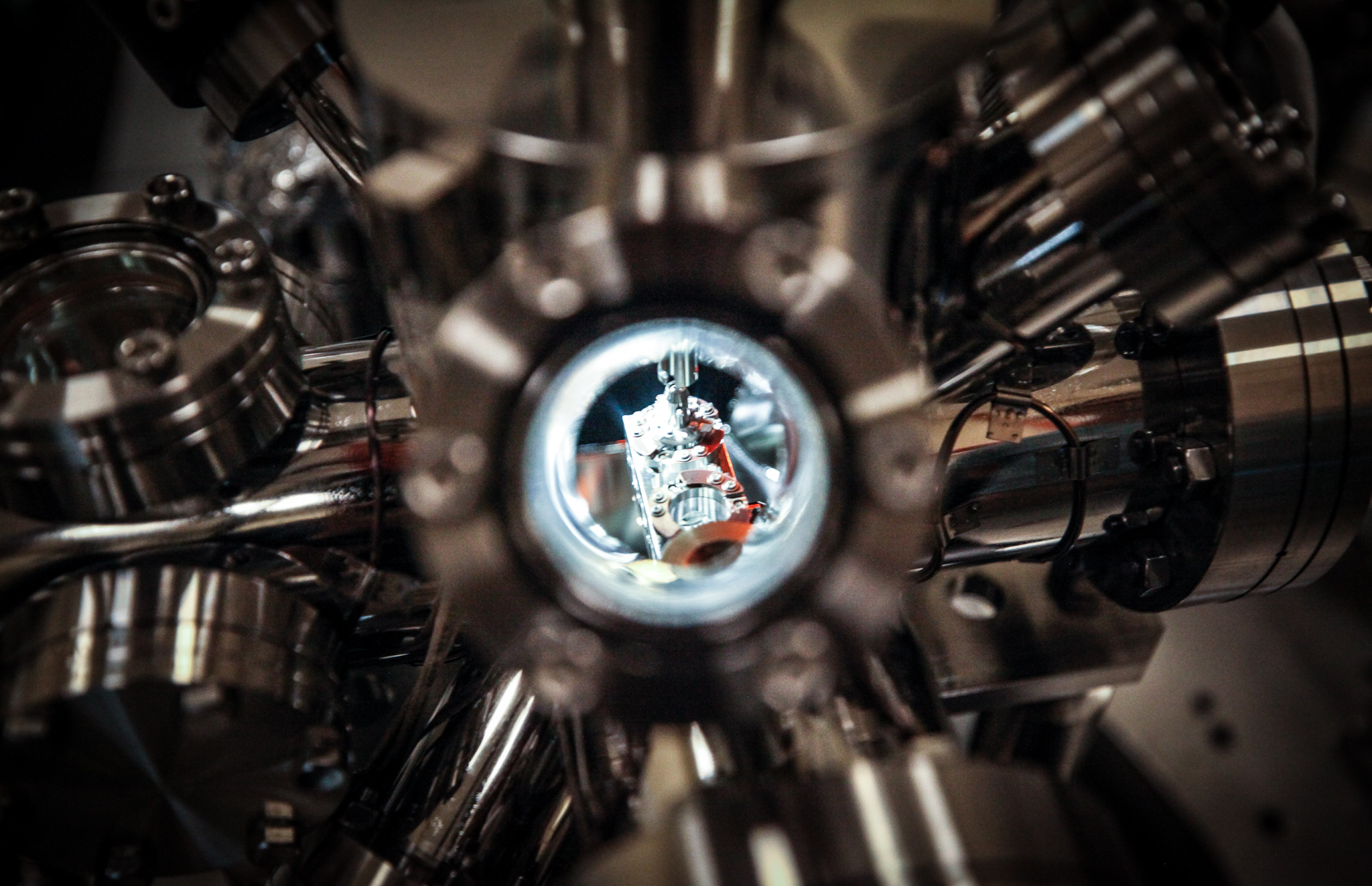 A close-up view of the tip of a scanning tunnelling microscope at NTU Singapore and a test sample inside the microscope’s ultra-high vacuum chamber
