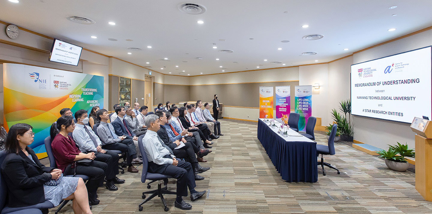 Photo of a group peoples attending a MoU signing ceremony.