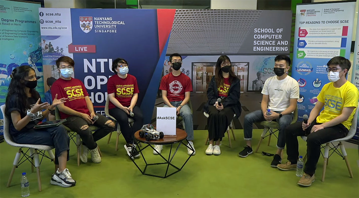 Full body screenshot of student panel (sitting).