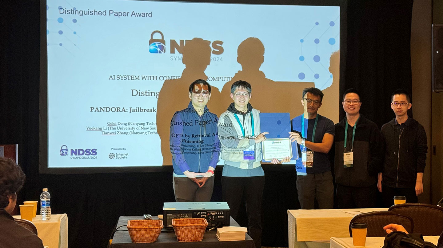 Photo of postgrads received the Distinguished Paper Award.