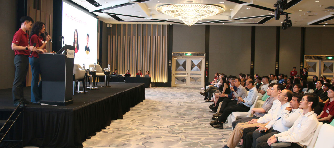 Photo of two students on stage sparked off a casual but engaging exchange among current and incoming students.