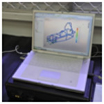 Laptop displaying car frame