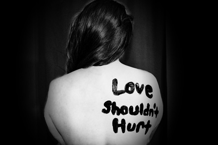 a woman's back painted with words
