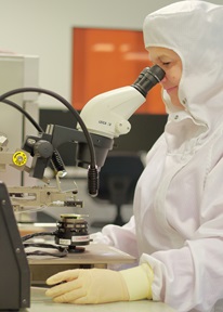 Female engineer working on a chip