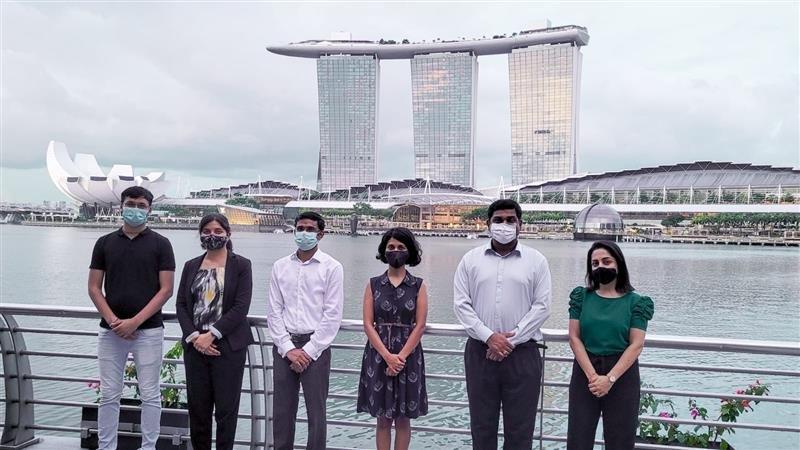 Rahul (3rd from left) and members of his SUMO team