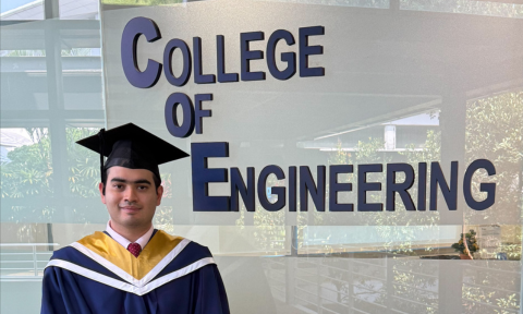 Graduation shot in front of CoE office