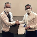 Director of Transport Safety Investigation Bureau, Mr Chong Chow Wah presenting a Certificate of Appreciation to Prof Vu N. Duong, Director of ATMRI