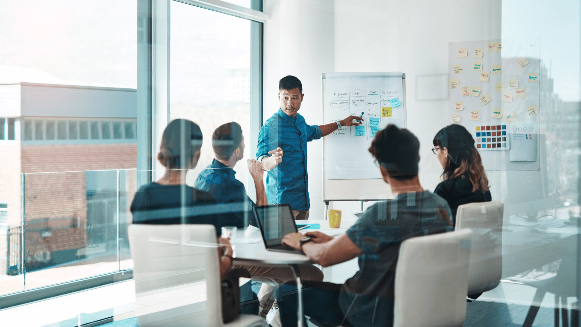 A group of businesspeople having a meeting in a modern office