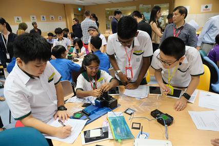 Students engaged in an experiment
